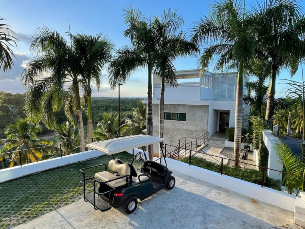 The home comes with a golf cart to ride around the estate. Picture: Airbnb