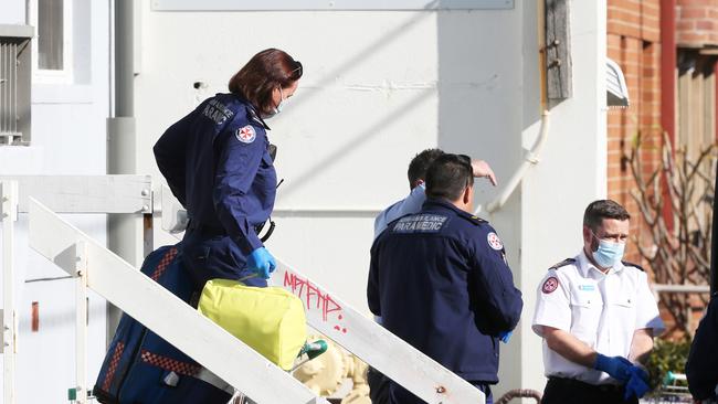 Emergency services at the scene of the alleged murder of Wes Prentice in July. Picture by Peter Lorimer