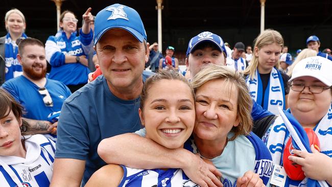 MELBOURNE, AUSTRALIA - NOVEMBER 26: Niamh Martin of the Kangaroos is seen with her parents during the 2023 AFLW Second Preliminary Final match between The North Melbourne Tasmanian Kangaroos and The Adelaide Crows at IKON Park on November 26, 2023 in Melbourne, Australia. (Photo by Michael Willson/AFL Photos via Getty Images)