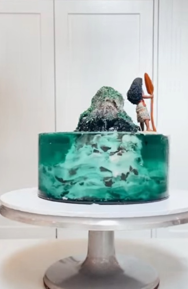 To help create the ocean illusion she used jelly. Picture: Facebook/Woolies/Coles Mudcake Hacks