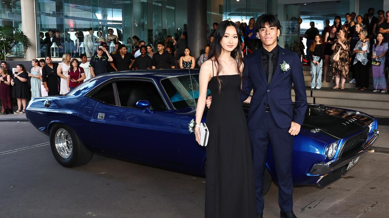 Janina Jong and Austin Chooprayoon arrive at the Bentley Park College Year 12 formal evening, held at the Hilton Cairns. Picture: Brendan Radke