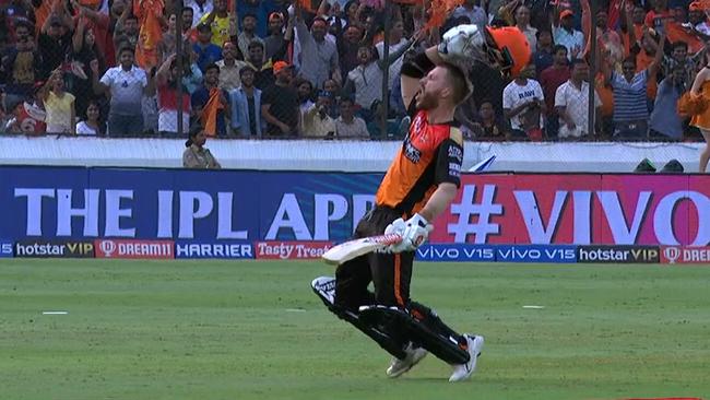 David Warner celebrates his century against Royal Challengers Bangalore.