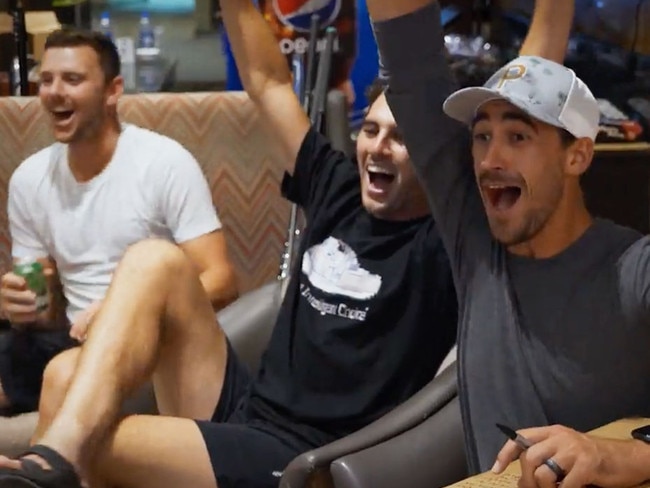 Pat Cummins, Josh Hazlewood and Mitchell Starc celebrate Usman Khawaja's virtual hole-in-one during the Australian tour of Pakistan. Photo: Amazon Prime Video