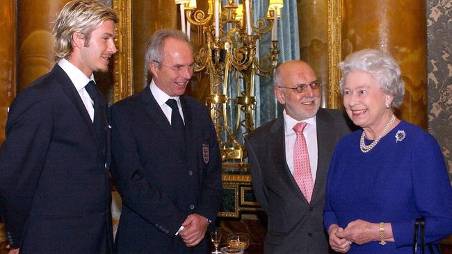 Queen Elizabeth II (R) with England soccer coach Sven-Goran Eriksson (2ndL), player David Beckham (L) and Football Association (FA) chairman Geoffrey Thompson (2ndR). Picture: AFP