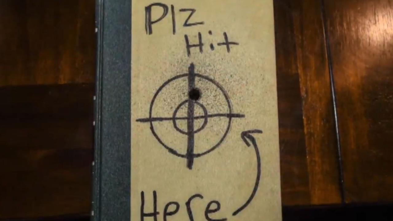 In the stunt, Perez had to shoot at a thick book her boyfriend was holding — but the bullet went through the book.