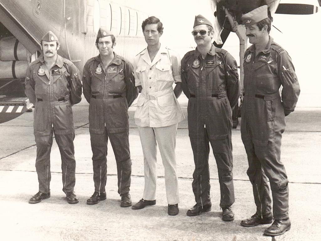 Reader Wally Davies writes: I met King Charles when he was Prince Charles, when he visited Queensland on tour in 1979. We flew him from Cairns to Lizard Island and then back to Townsville in a 35 Squadron Caribou, which had the call sign of Regal 1. L to R in the photo are Wally Davies, Ed Morris, Prince Charles, John Staal and John Caldwell. Picture: Supplied