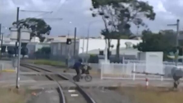 A narrow miss caught on camera by a train-mounted camera. Picture: Queensland Rail.