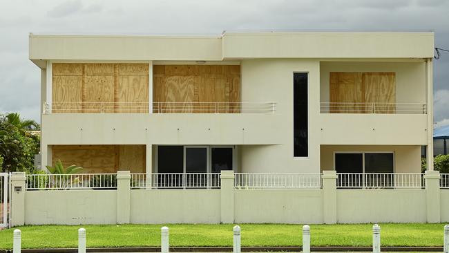 A Townsville house is boarded up with windows in preparation for Cyclone Kirrily. Picture: Getty Images