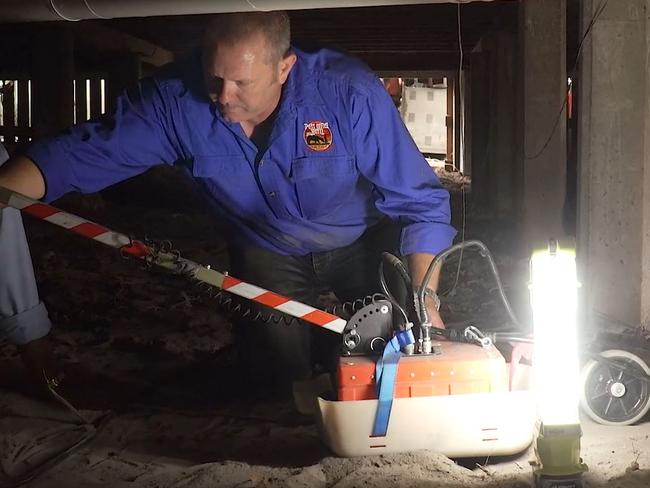 Forensic officers use ground penetrating radar under the Enright house in Inala as part of their investigation into 1960s death of Peter Enright. Picture: QPS