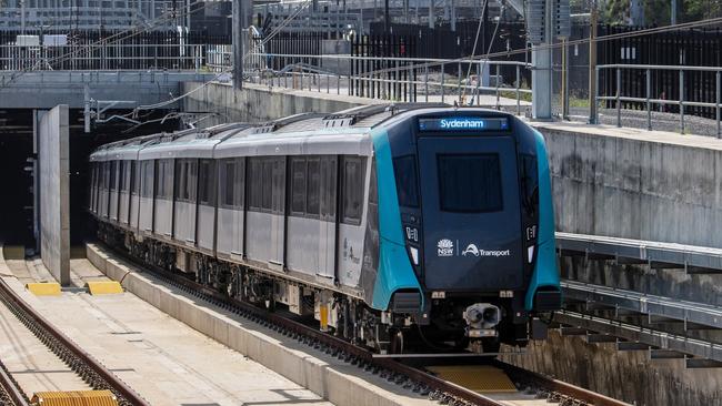 Sydney Metro City and Southwest train TS5 leaves the tunnel at the southern dive during testing.