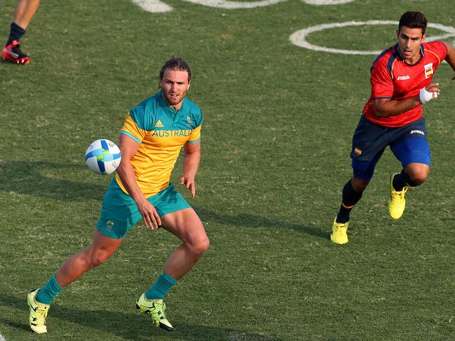 Lewis Holland in action during the 2016 Rio Olympic Men's Rugby Sevens game between Australia and Spain at Deodoro Stadium, Rio. Pics Adam Head