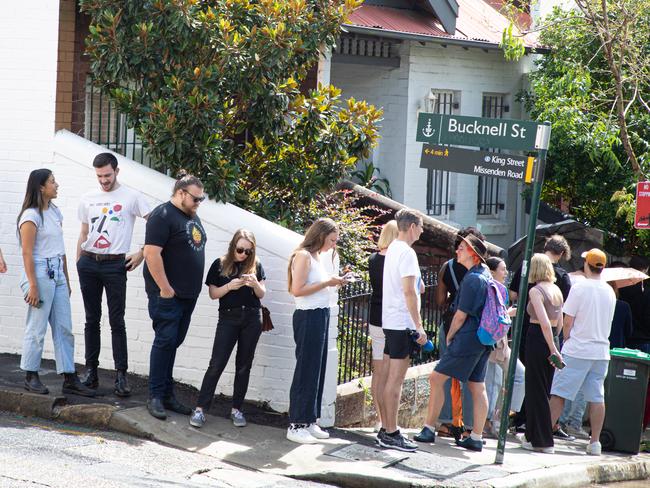 A  long line of people waiting to inspect rental accomodation, snakes around the block, in Newtown. There is a rental housing shortage many cities around Australia. Picture - Chris Pavlich for The Australian