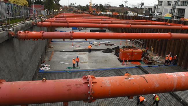 The Victorian Government is spending billions removing 50 of Melbourne’s 180 crossings, sinking some lines (above) and raising others. Picture: Chris Eastman