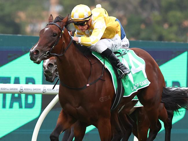 SYDNEY, AUSTRALIA - MARCH 23: Blake Shinn riding  Lady Of Camelot wins Race 8 Golden Slipper during the Golden Slipper Day - Sydney Racing at Rosehill Gardens on March 23, 2024 in Sydney, Australia. (Photo by Jeremy Ng/Getty Images)