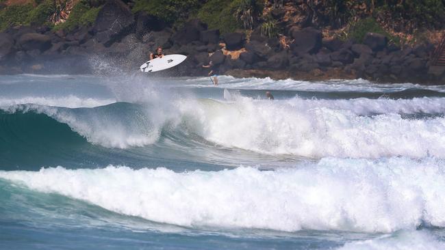 Surfers enjoy big swell at Kirra, part of the Eighth World Surfing Reserve on the Gold Coast. Picture: Adam Head