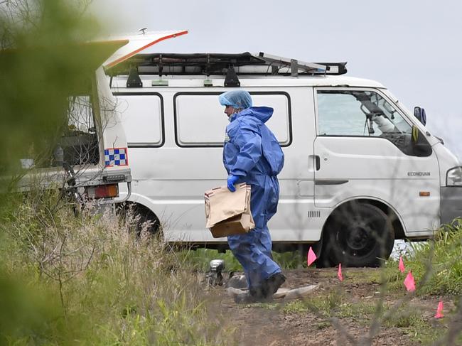 Police investigate a suspicious death in bushland near Preston, Thursday, January 7, 2021. Picture: Kevin Farmer