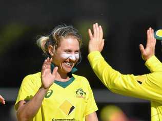 Delissa Kimmince (left) of Australia celebrates with Meg Lanning (right). Picture: DARREN ENGLAND