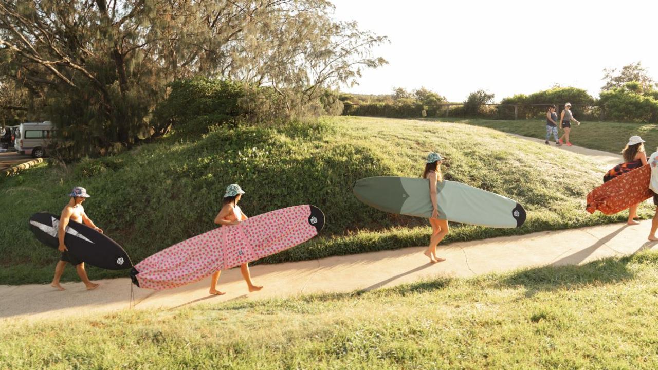 Dan and Sarah used to surf together growing up in Victoria. Picture: Boardsox