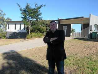 Clint Christison with one of the Grantham properties being sold by Lockyer Valley Regional Council. Picture: Gary Worrall