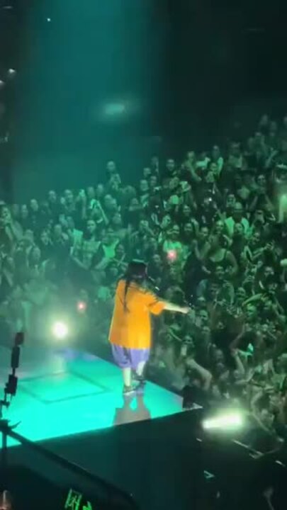 Billie Eilish performs in honour of Charlize Zmuda