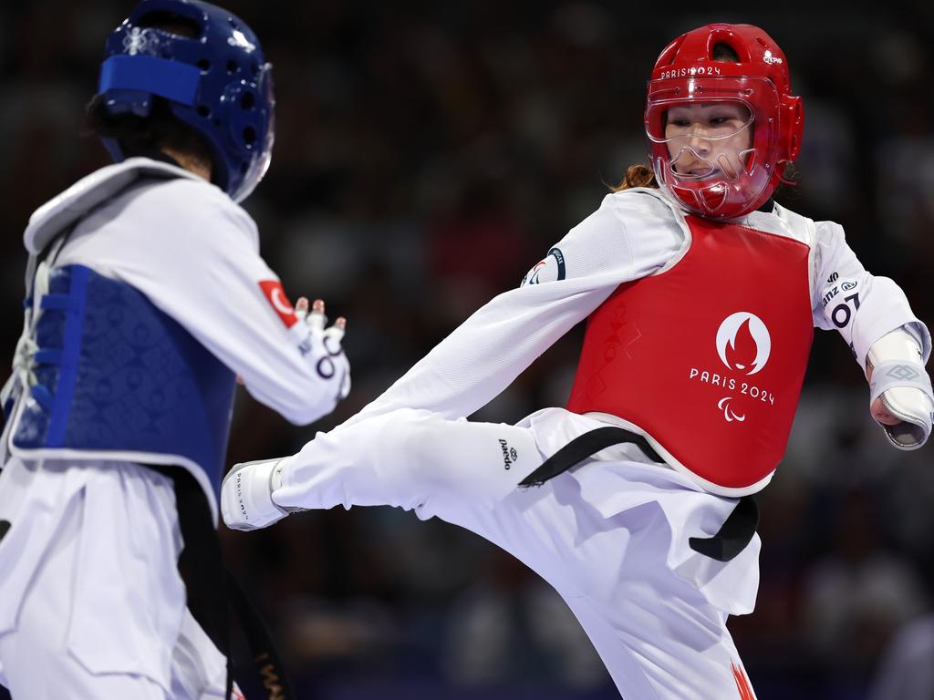 Zakia Khudadadi of the Refugee Paralympic Team, and Nurcihan Ekinci of Team Turkey, compete in the women's K44-47kg repechage, contest 128. Picture: Steph Chambers/Getty Images