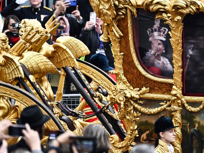 Queen Elizabeth II projected on the Gold State Coach during the Platinum Pageant in London. Picture: AFP