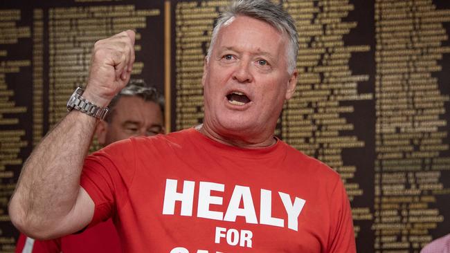 Labor’s Michael Healy celebrates with volunteers at the West Cairns Bowls Club on Saturday night. Picture: Brian Cassey