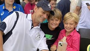 Adam Gilchrist taking photos with excited fans at Lismore's cricket picnic day at Oakes Oval on Saturday with other famous cricketers including Stuart MacGill, Ricky Ponting and more.