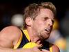 Crows hush, hush on captaincy, as key pair re-sign