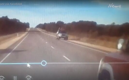 Screenshot from footage taken on the Princes Highway where two cars almost collided. Video: Nigel Schutz