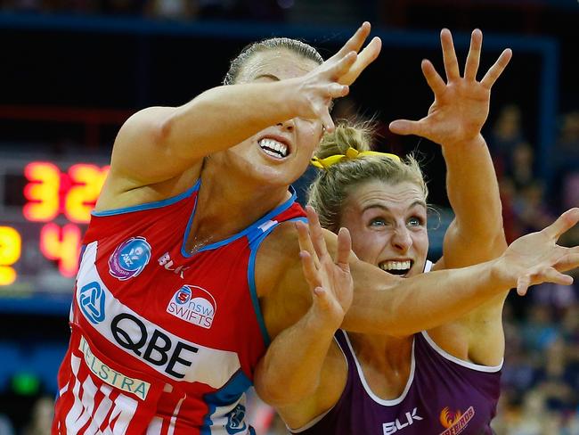 BRISBANE, AUSTRALIA - JULY 31: Gabi Simpson of the Firebirds competes for the ball with Kimberlee Green of the swifts during the 2016 ANZ Championship Grand Final match between the Queensland Firebirds and the NSW Swifts at Brisbane Entertainment Centre on July 31, 2016 in Brisbane, Australia. (Photo by Jason O'Brien/Getty Images)
