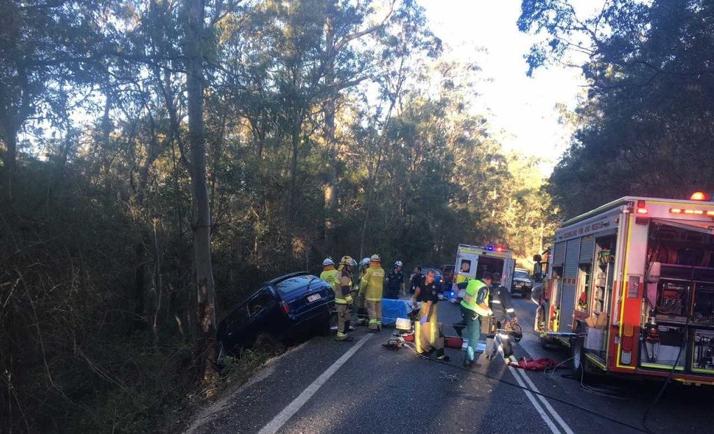 A man suffered multiple injuries after losing control of his car at Ravensbourne. Picture: RACQ LifeFlight Rescue