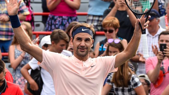Roger Federer celebrates his victory over David Ferrer.