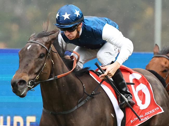 SYDNEY, AUSTRALIA - AUGUST 05: Jason Collett riding Wategos wins Race 6 Jockey Celebration Day during "Missile Stakes Day" - Sydney Racing at Rosehill Gardens on August 05, 2023 in Sydney, Australia. (Photo by Jeremy Ng/Getty Images)