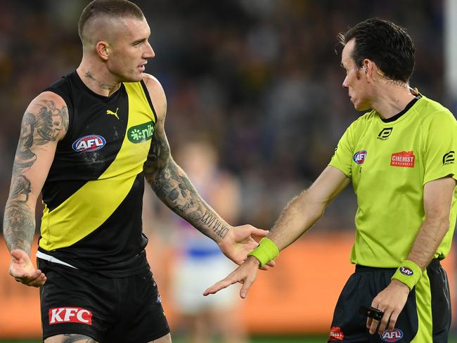 MELBOURNE, AUSTRALIA - APRIL 08: Dustin Martin of the Tigers speaks to the umpire during the round four AFL match between Richmond Tigers and Western Bulldogs at Melbourne Cricket Ground, on April 08, 2023, in Melbourne, Australia. (Photo by Quinn Rooney/Getty Images)