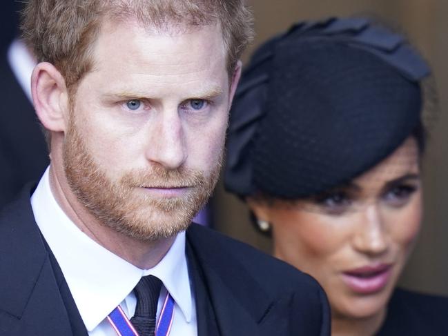 LONDON, ENGLAND - SEPTEMBER 14: Prince Harry and Meghan, Duchess of Sussex leave Westminster Hall, London after the coffin of Queen Elizabeth II was brought to the hall to lie in state ahead of her funeral on Monday on September 14, 2022 in London, England. Queen Elizabeth II's coffin is taken in procession on a Gun Carriage of The King's Troop Royal Horse Artillery from Buckingham Palace to Westminster Hall where she will lay in state until the early morning of her funeral. Queen Elizabeth II died at Balmoral Castle in Scotland on September 8, 2022, and is succeeded by her eldest son, King Charles III. (Photo Danny Lawson - WPA Pool/Getty Images)