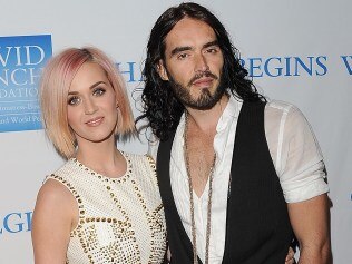 Singer Katy Perry (L) and actor Russell Brand attend the 3rd Annual Change Begins Within Benefit Celebration presented by The David Lynch Foundation held at LACMA on December 3, 2011 in Los Angeles, California. (Photo by Jason Merritt/Getty Images)
