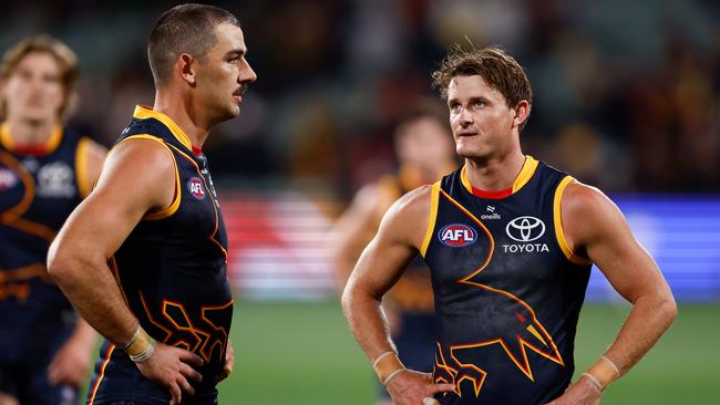 ADELAIDE, AUSTRALIA - APRIL 04: Taylor Walker (left) and Matt Crouch of the Crows look dejected after a loss during the 2024 AFL Round 04 match between the Adelaide Crows and the Melbourne Demons at Adelaide Oval on April 04, 2024 in Adelaide, Australia. (Photo by Michael Willson/AFL Photos via Getty Images)