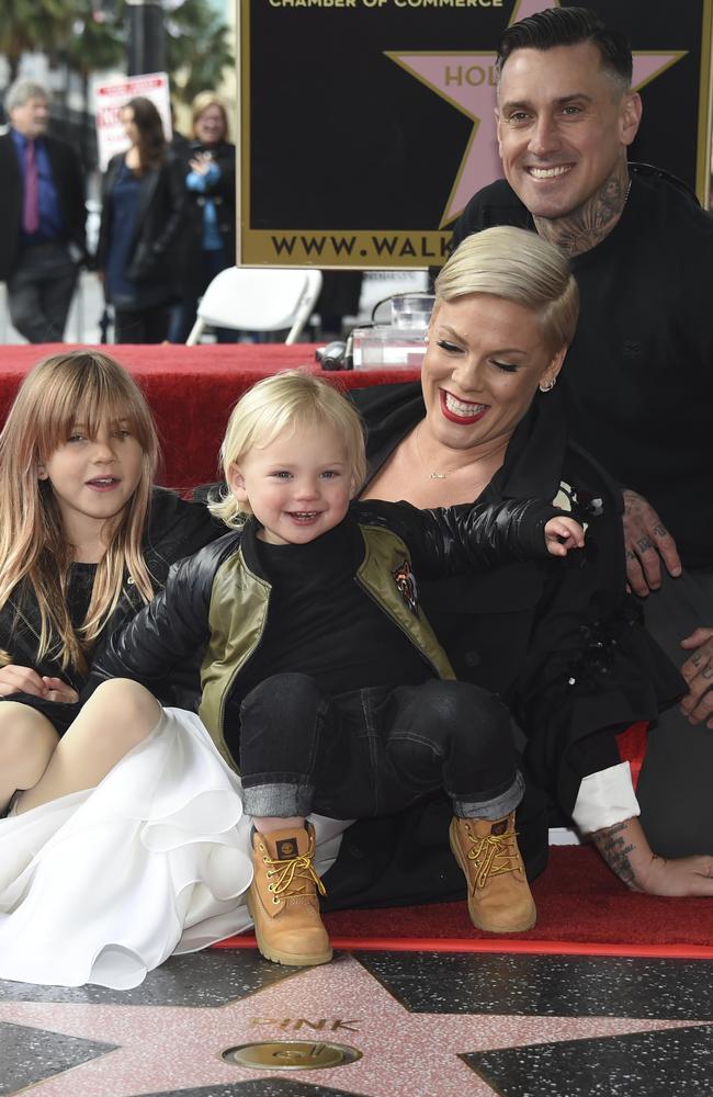 Pink with husband Carey Hart, and children Willow Sage and Jameson, on her star. Picture: AP