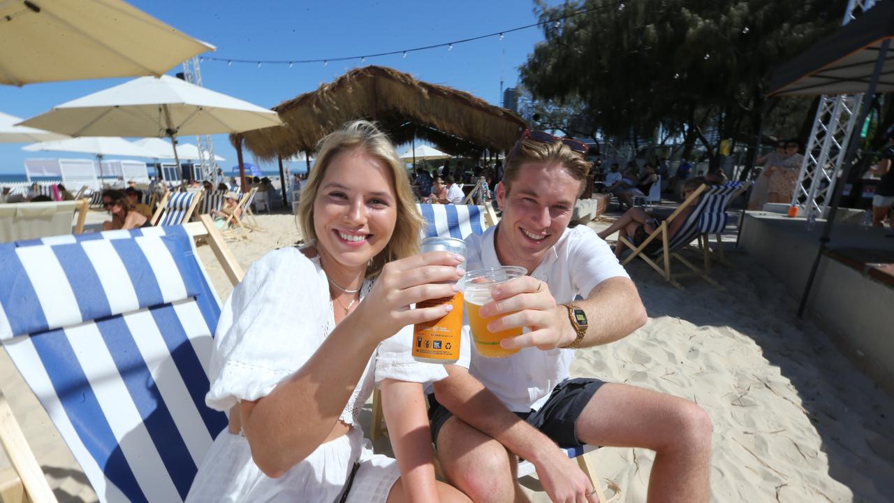 People attending the opening of The Kurrawa Beach Club at Kurrawa Terrace Beachfront. Pic Mike BatterhamL-R Issy Chambers and Tasman Davis of Mermaid Beach with beach club staff member Shardia Pull attending the opening of The Kurrawa Beach Club at Kurrawa Terrace Beachfront. Pic Mike Batterham