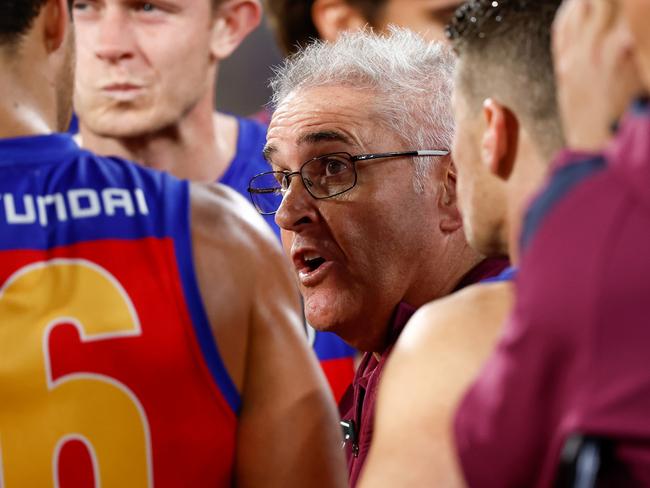 MELBOURNE, AUSTRALIA – APRIL 11: Chris Fagan, Senior Coach of the Lions addresses his players during the 2024 AFL Round 05 match between the Melbourne Demons and the Brisbane Lions at the Melbourne Cricket Ground on April 11, 2024 in Melbourne, Australia. (Photo by Michael Willson/AFL Photos via Getty Images)