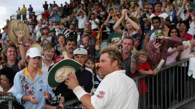 SPORT. BCM. 13/7/04. Shane Warne of Australia leaves the field after the end on day five of the Australia versus Sri Lanka test match in Cairns. Pic Darren England.