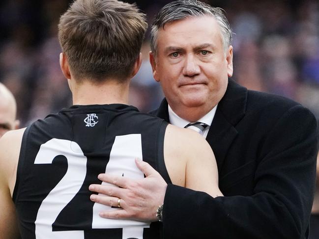 MELBOURNE, VICTORIA - SEPTEMBER 29:  Collingwood president Eddie McGuire hugs Josh Thomas of the Magpies after their loss during the 2018 AFL Grand Final match between the Collingwood Magpies and the West Coast Eagles at Melbourne Cricket Ground on September 29, 2018 in Melbourne, Australia.  (Photo by Michael Dodge/AFL Media/Getty Images)