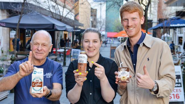 Alec Mastrangelo, Matilda Wise and Callum Strong with their favourite iced coffees. The Bickford’s product will launch on Tuesday. Picture: Brenton Edwards