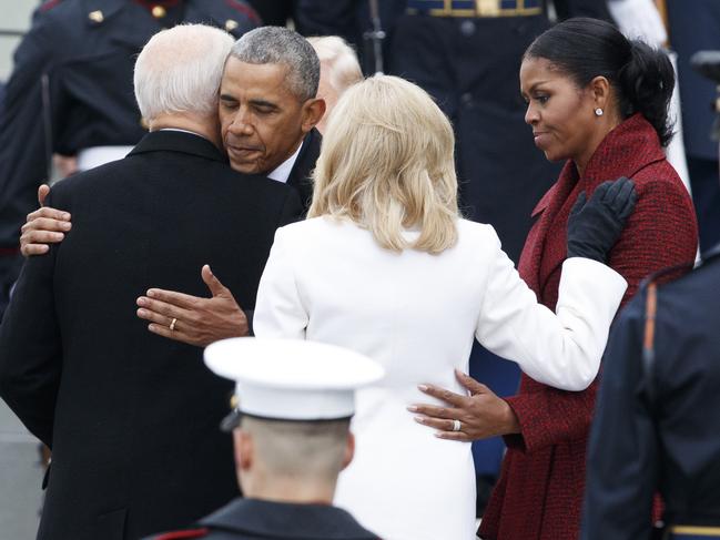 Former President Barack Obama hugs former Vice President Joe Biden at the Capitol on January 20, 2017, in Washington after President Donald Trump was inaugurated. Picture: AP