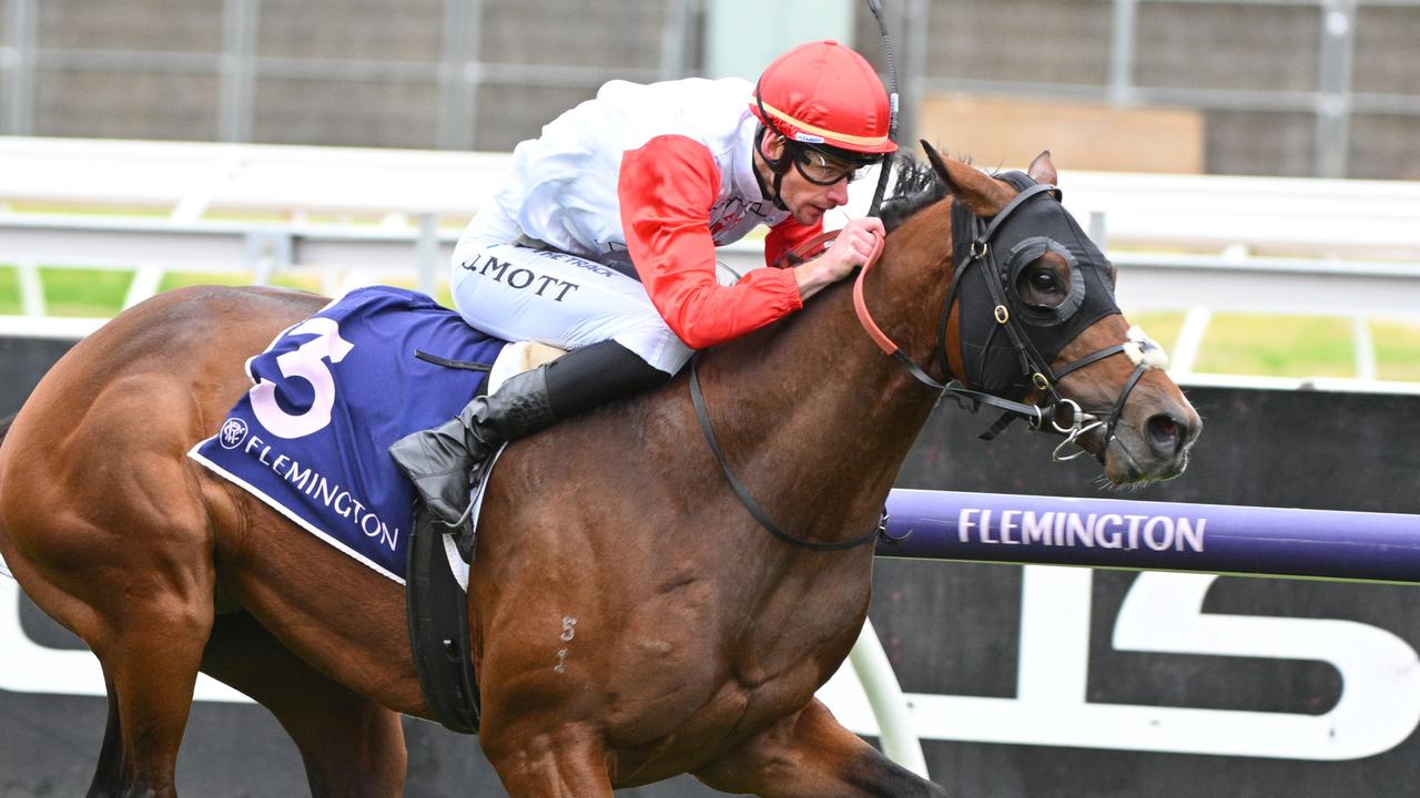 MELBOURNE, AUSTRALIA - JULY 20: Jamie Mott riding Red Aces winning Race 1, the Byerley Handicap - Betting Odds during Melbourne Racing at Flemington Racecourse on July 20, 2024 in Melbourne, Australia. (Photo by Vince Caligiuri/Getty Images)