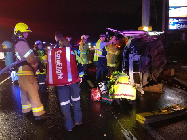 Emergency services attending to the accident at Springwood overnight.