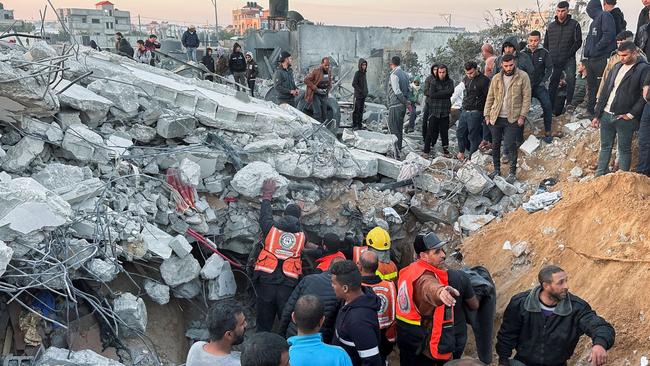 Palestinians searched for casualties at the site of an Israeli strike in Rafah on Friday. Picture: Reuters/WSJ