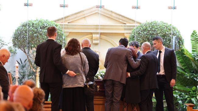 Mourners attend the funeral of slain pediatrician Dr Michael Yung at Berry’s Funeral Home on Magill Rd in Norwood. Picture: Russell Millard