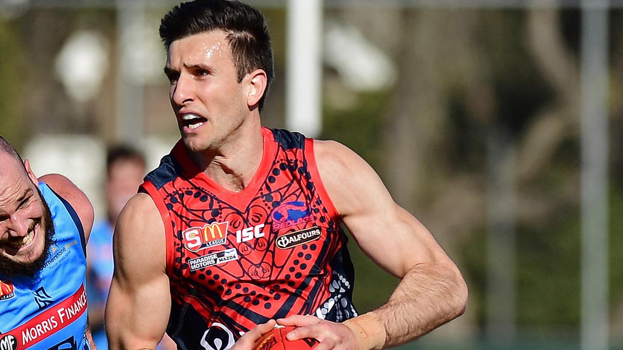 14/07/18 - SANFL: Sturt v Norwood at Unley Oval.  Sturt's Zane Kirkwood chases Norwood's Matthew Panos.Picture: Tom Huntley